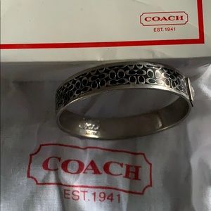 Women’s coach bangle with box and bag.
